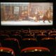 cartoon movie showing on theater screen